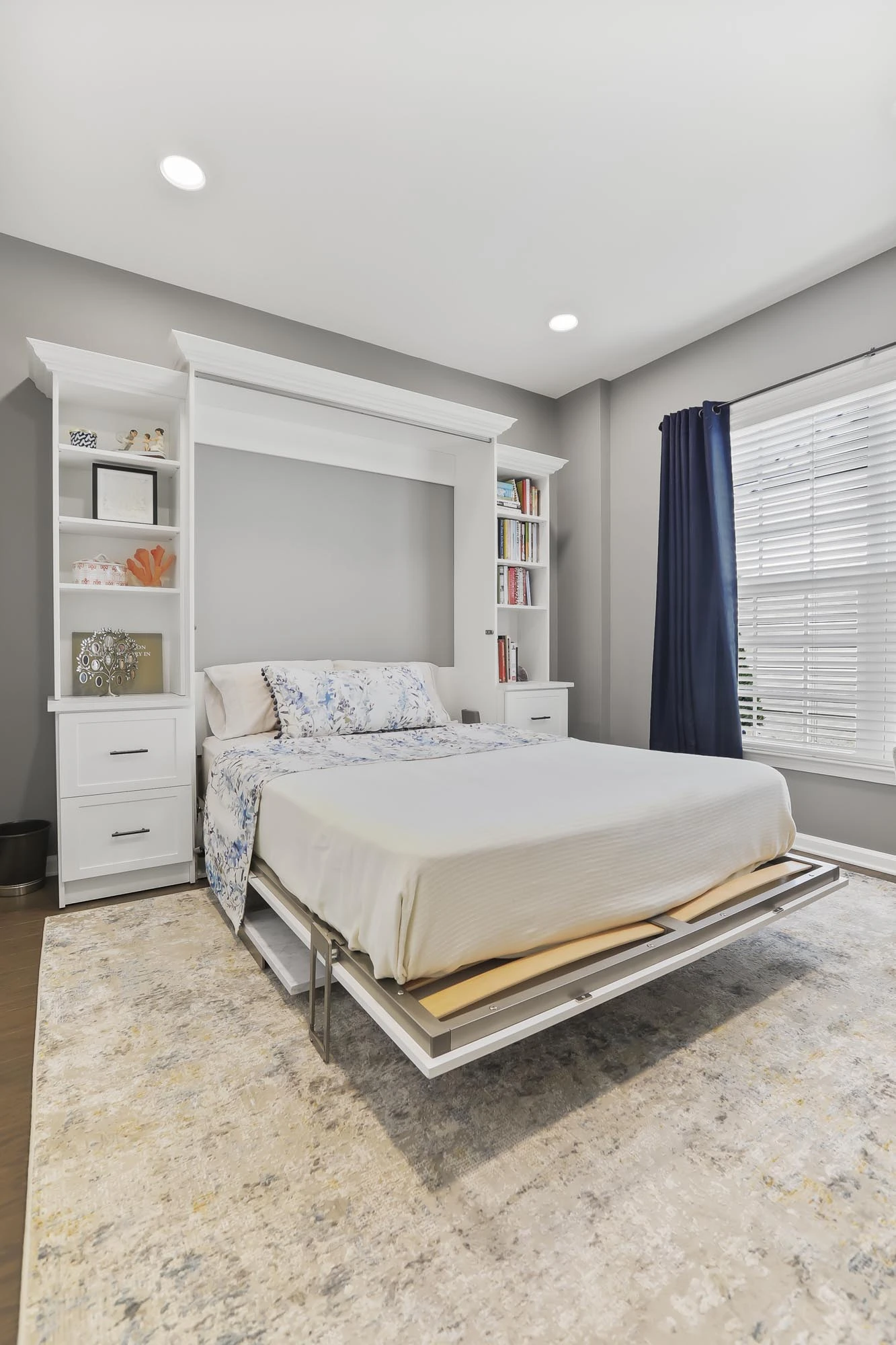 Wallbed with bookshelves and custom lighting from Bella Systems Murphy Beds in NJ